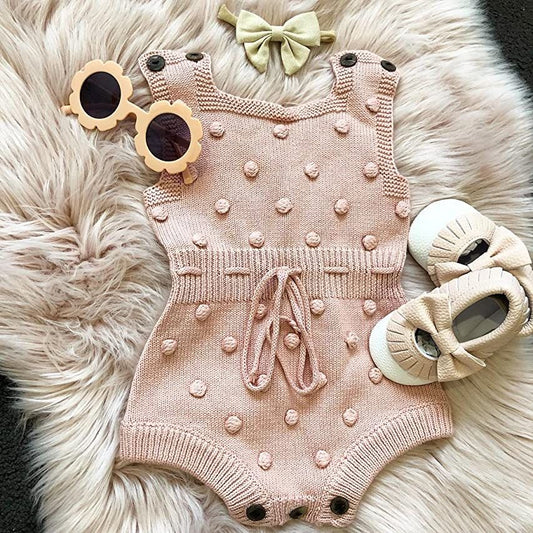 ROMPER TEJIDO ROSA CON BOLITAS